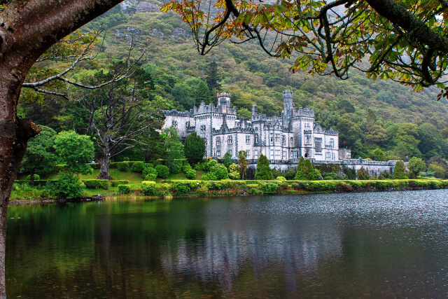 Kylemore Abbey overlooking water at National Park in Ireland 